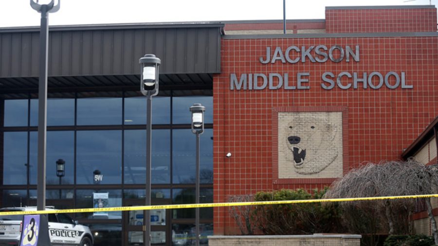 Jackson Middle School was taped off on Feb. 20. Jackson schools were put on lockdown and evacuated after a middle school student brought a gun to school and shot himself in the bathroom. (Leah Klafczynski/Beacon Journal/Ohio.com)