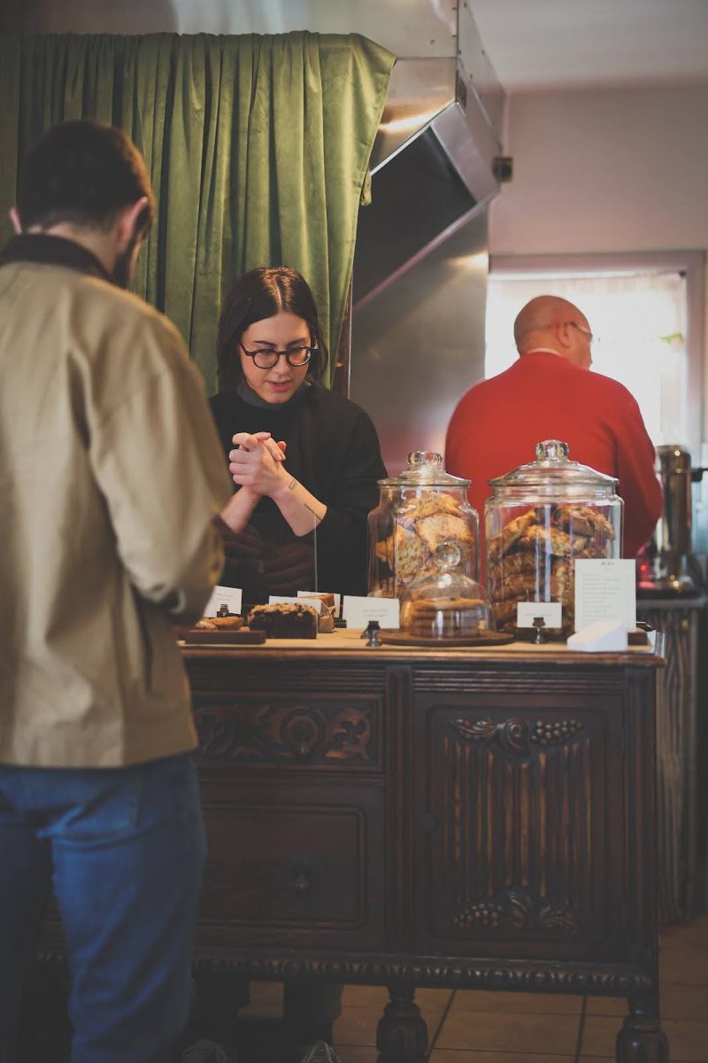 Hannah Minks helps check out regular
customer John Laubacher at The
Monastic Home. PHOTO COURTESY
OF HANNAH MINKS